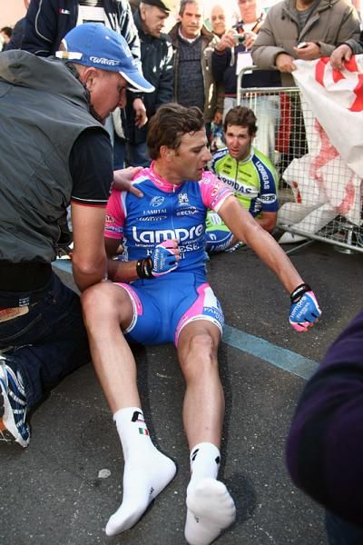 Alessandro Petacchi (Lampre-Farnese Vini) assesses the damage following his crash.