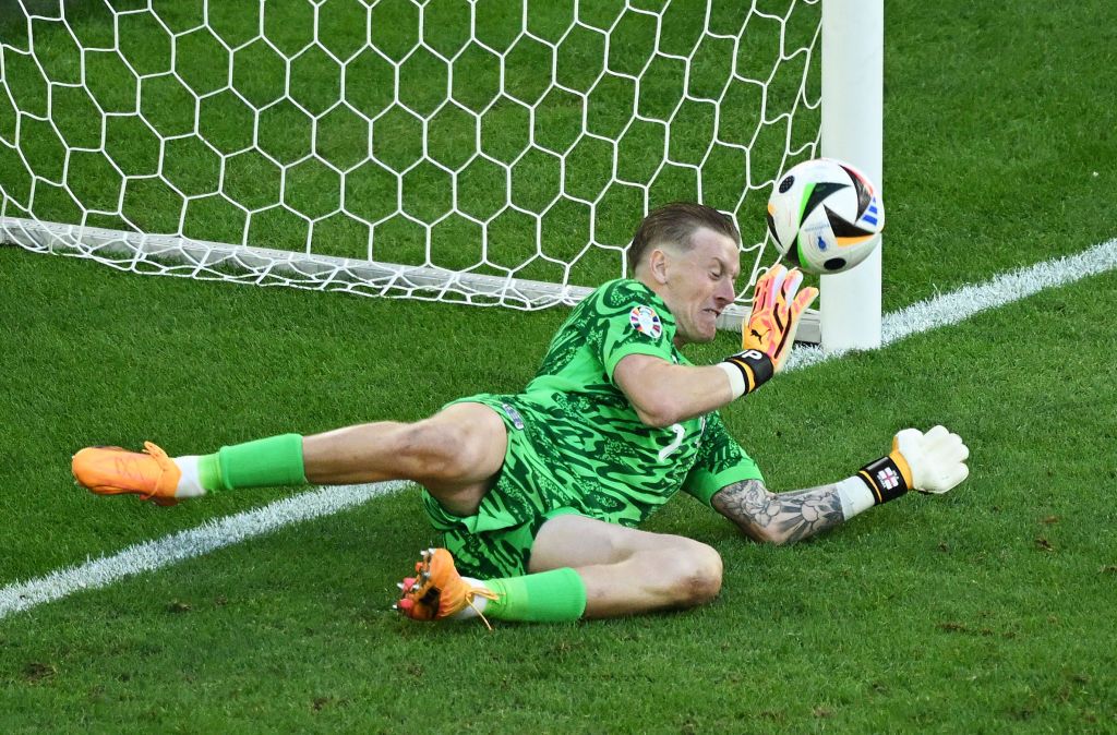 Jordan Pickford of England saves the first penalty from Manuel Akanji of Switzerland (not pictured) in the penalty shoot out during the UEFA EURO 2024 quarter-final match between England and Switzerland at Düsseldorf Arena on July 06, 2024 in Dusseldorf, Germany. (Photo by Clive Mason/Getty Images)