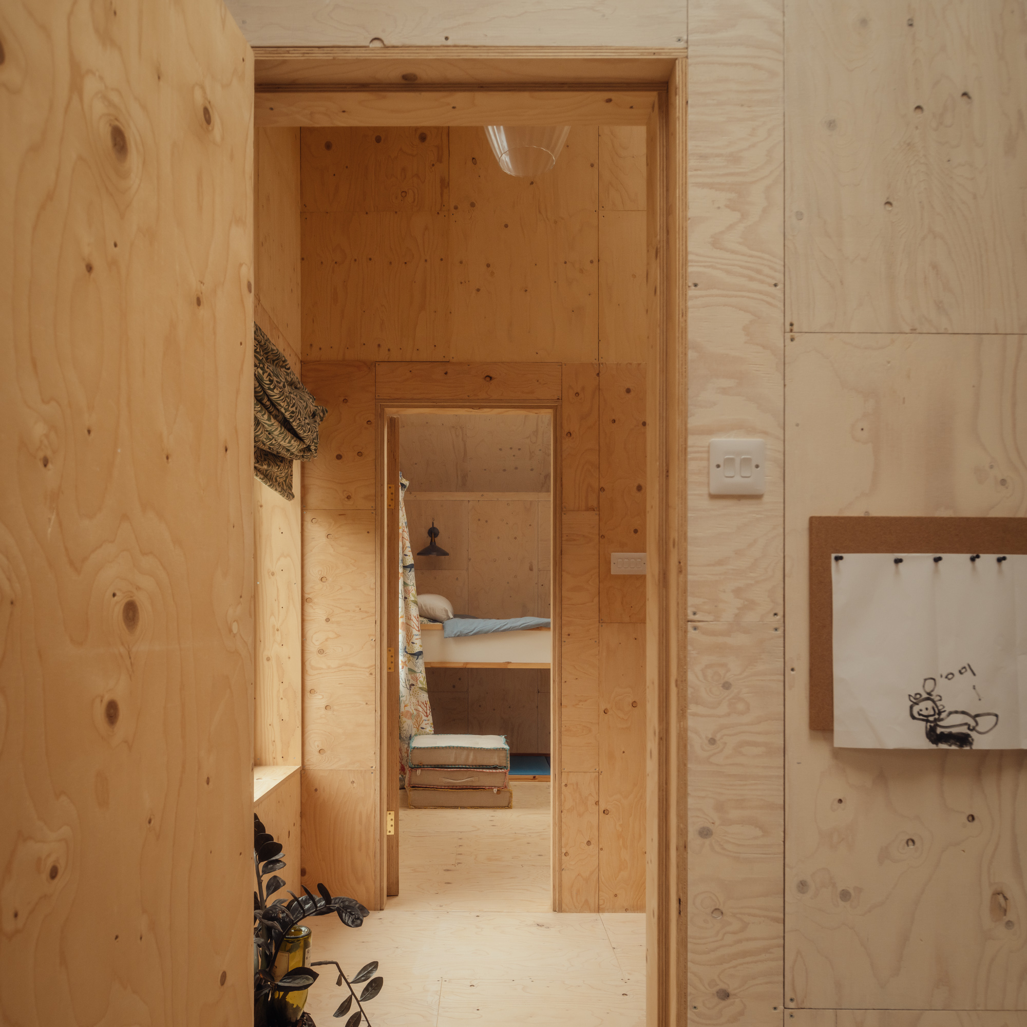 Two children's bedrooms are housed on the first floor of the extension