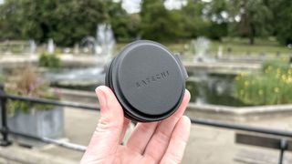 Satechi OntheGO Charger in hand with park in background