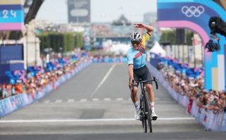 PARIS FRANCE AUGUST 03 Remco Evenepoel of Team Belgium celebrates at finish line as Gold medal winner during the Mens Road Race on day eight of the Olympic Games Paris 2024 at trocadero on August 03 2024 in Paris France Photo by Jared C TiltonGetty Images