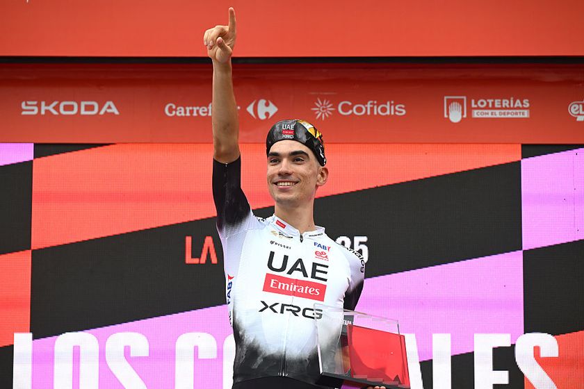 LOS CORRALES DE BUELNA, SPAIN - SEPTEMBER 04: Juan Ayuso of Spain and UAE Team Emirates - XRGl celebrates at podium as stage winner during the La Vuelta - 80th Tour of Spain 2025, Stage 12 a 144.9km stage from Laredo to Los Corrales de Buelna / #UCIWT / on September 04, 2025 in Los Corrales de Buelna, Spain. (Photo by Dario Belingheri/Getty Images)