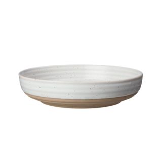 A white plate bowl with a brown base