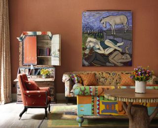 Living room in orange by Kit Kemp