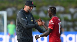 Liverpool manager Jurgen Klopp with Sadio Mane during a pre-season friendly against Stuttgart in Saalfelden, Austria on 20 July, 2021