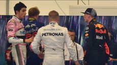 Max Verstappen (right) confronts Esteban Ocon (left) after the F1 Brazilian Grand Prix