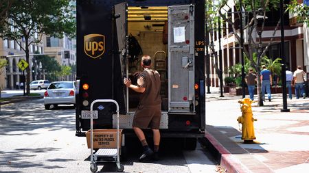 UPS driver and van © Kevork Djansezian/Getty Images