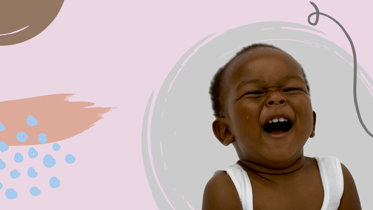baby laughing on a colourful background illustrating the most popular baby names