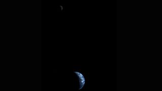 This picture of a crescent-shaped Earth and Moon, the first of its kind ever taken by a spacecraft, was recorded Sept. 18, 1977, by NASA's Voyager 1 when it was 7.25 million miles (11.66 million kilometers) from Earth. Credit: NASA/JPL