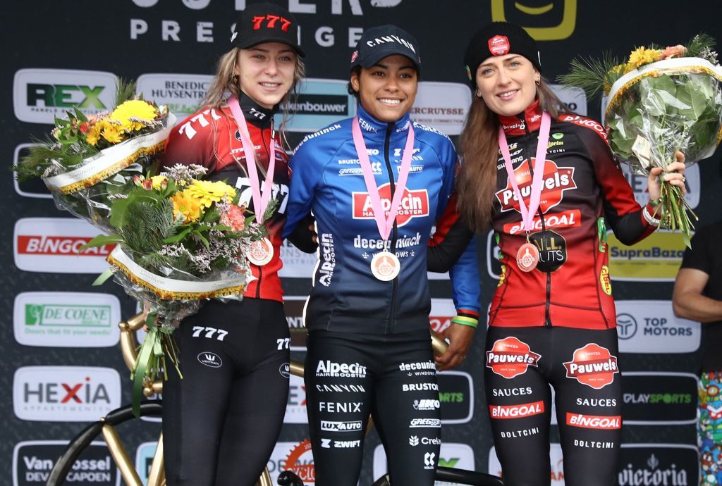From L Secondplaced Netherlands Inge van der Heijden winner Netherlands Ceylin Del Carmen Alvarado and thirdplaced Netherlands Denise Betsema pose on the podium after the womens elite race of the Superprestige Gullegem the 7th stage in the Superprestige cyclocross cycling competition in Gullegem on January 7 2023 Belgium OUT Photo by DAVID PINTENS BELGA AFP Belgium OUT Photo by DAVID PINTENSBELGAAFP via Getty Images