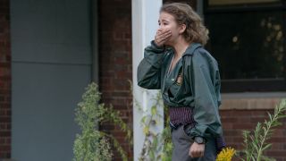 Millicent Simmonds holds her hand to her mouth in A Quiet Place Part II