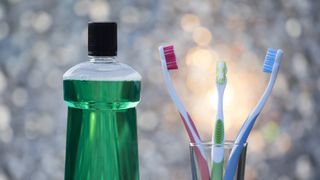 Is mouthwash necessary? image show mouthwash and toothbrush