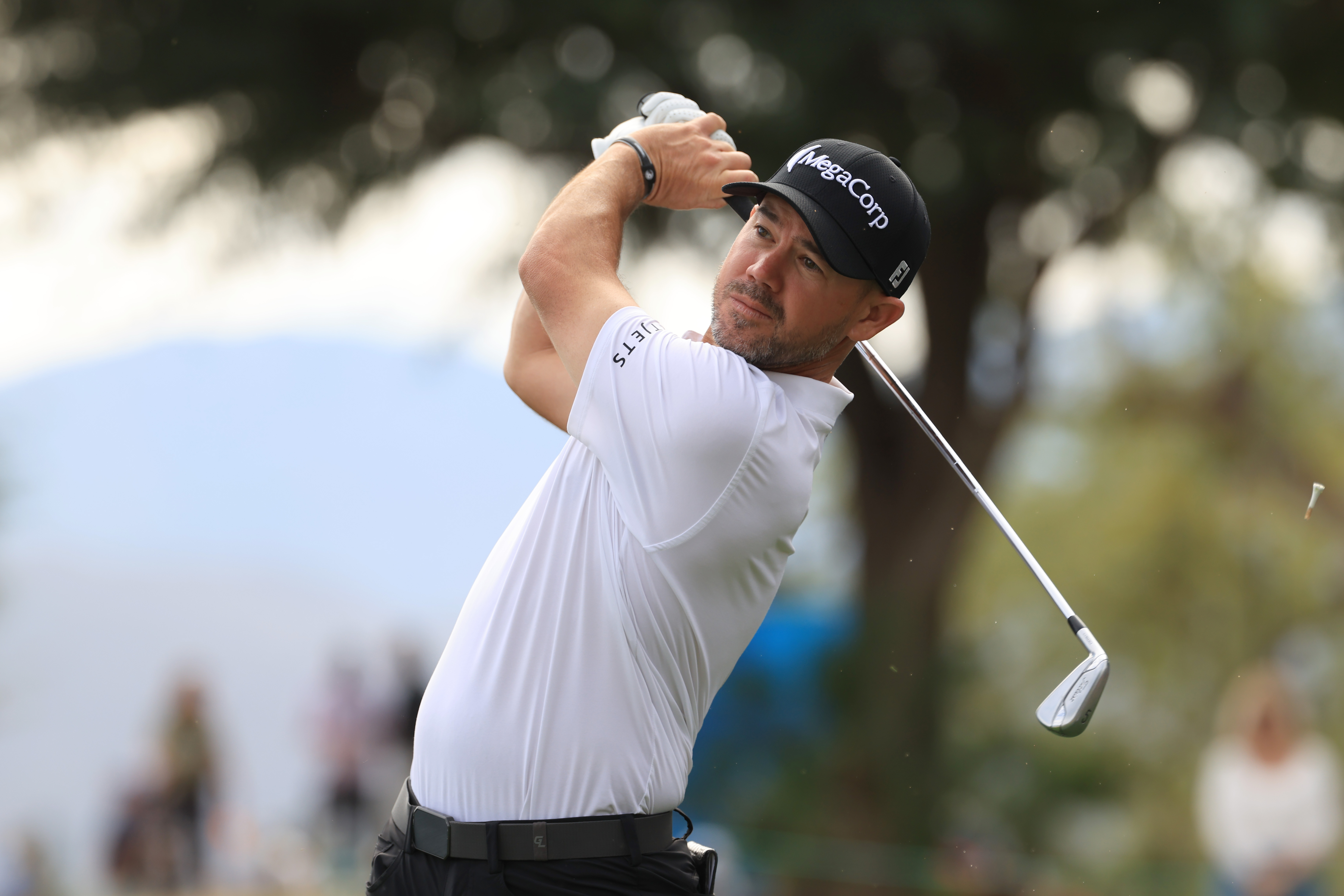 Brian Harman hits a utility iron