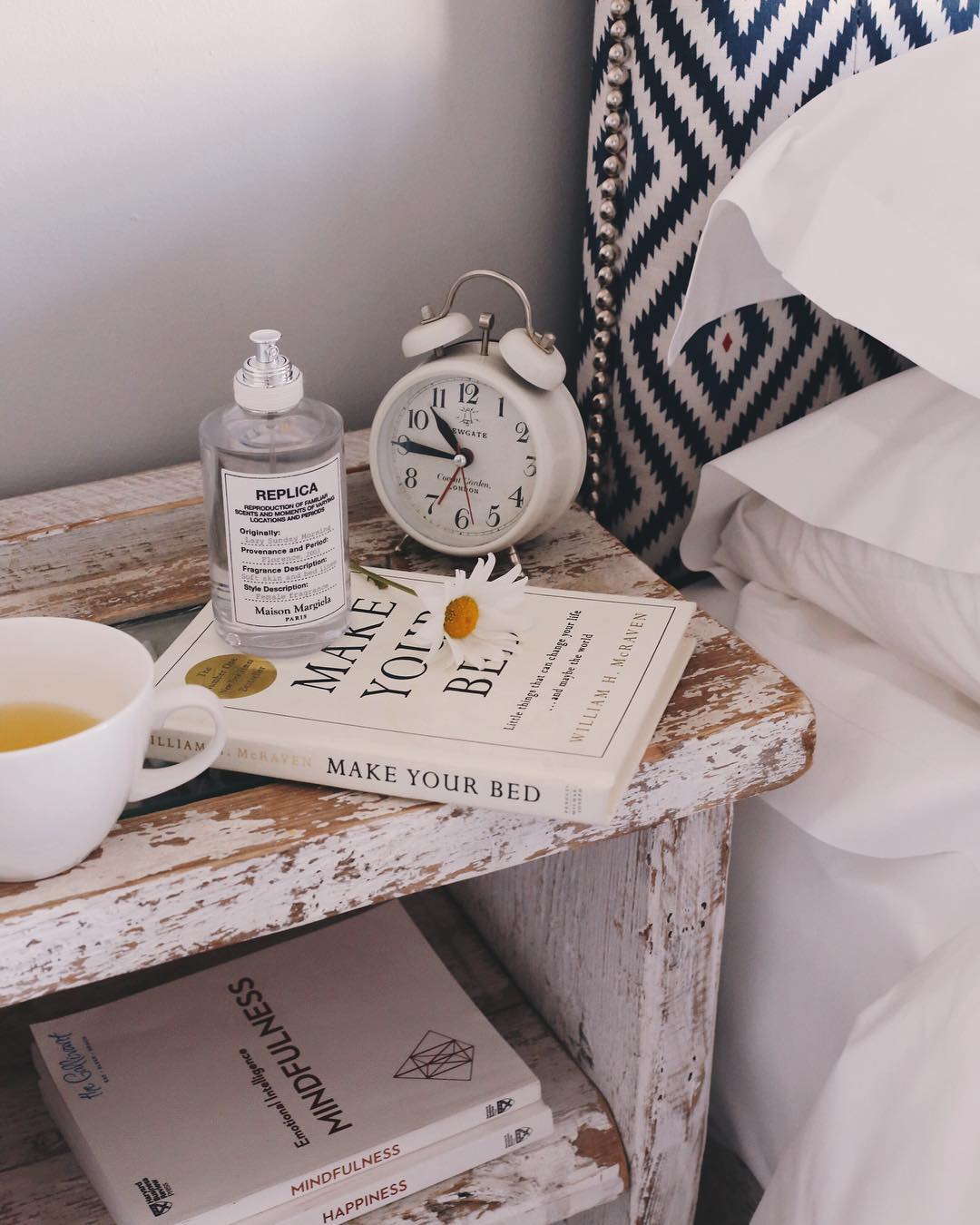 Maison Margiela Lazy Sunday Morning perfume on bedside table