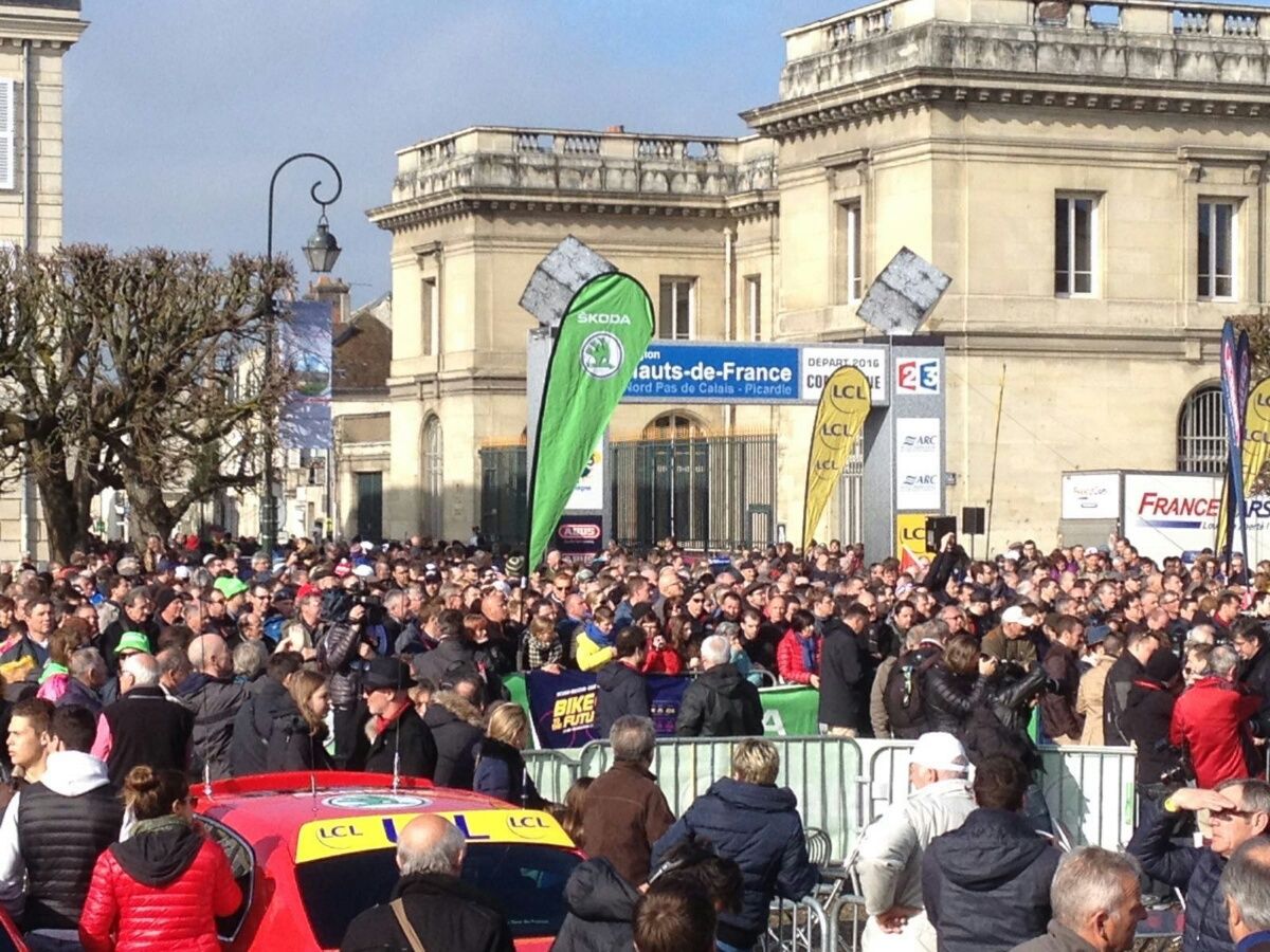 Crowds gather by the start line