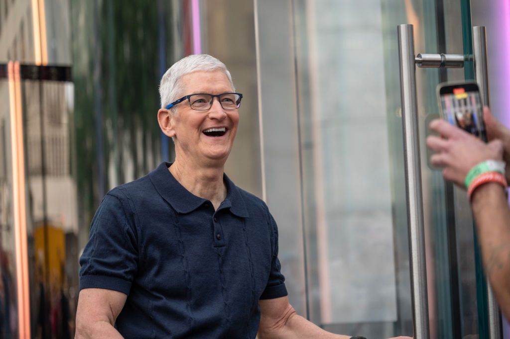 Apple CEO Tim Cook outside the 5th Avenue Apple Store in NYC.