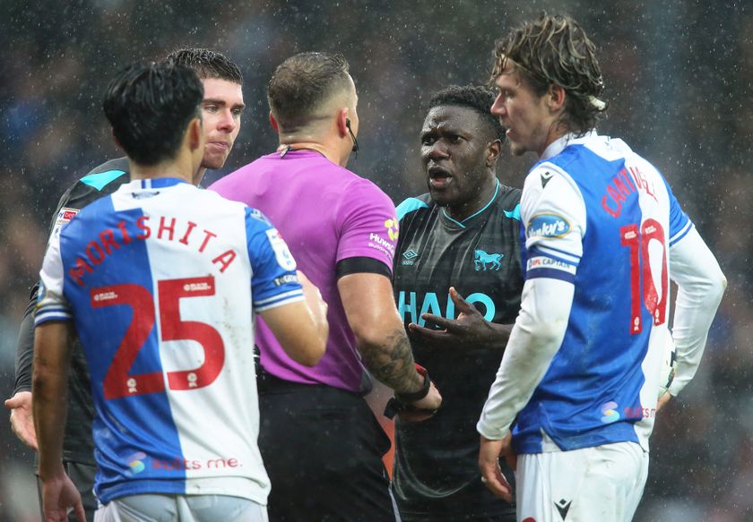 BLACKBURN, ENGLAND - SEPTEMBER 20: Ipswich Town&#039;s Azor Matusiwa remonstrates with referee Stephen Martin after Blackburn Rovers were awarded a second half penalty, from which Todd Cantwell (right) scored the opening goal during the Sky Bet Championship match between Blackburn Rovers and Ipswich Town at Ewood Park on September 20, 2025 in Blackburn, England. (Photo by Rich Linley - CameraSport via Getty Images) 