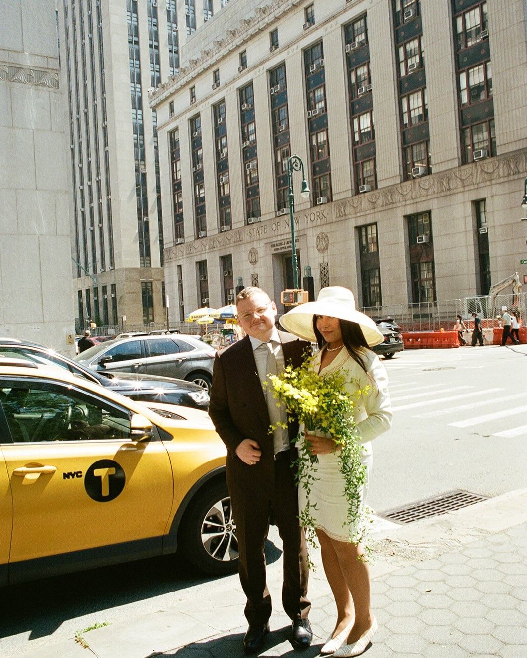 Ana Escalante wearing a wedding suit.