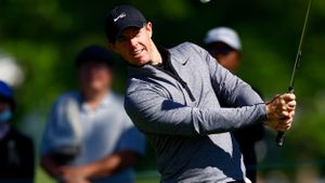 Rory McIlroy takes a practice shot on the ninth green during the pro-am prior to the 2022 RBC Canadian Open