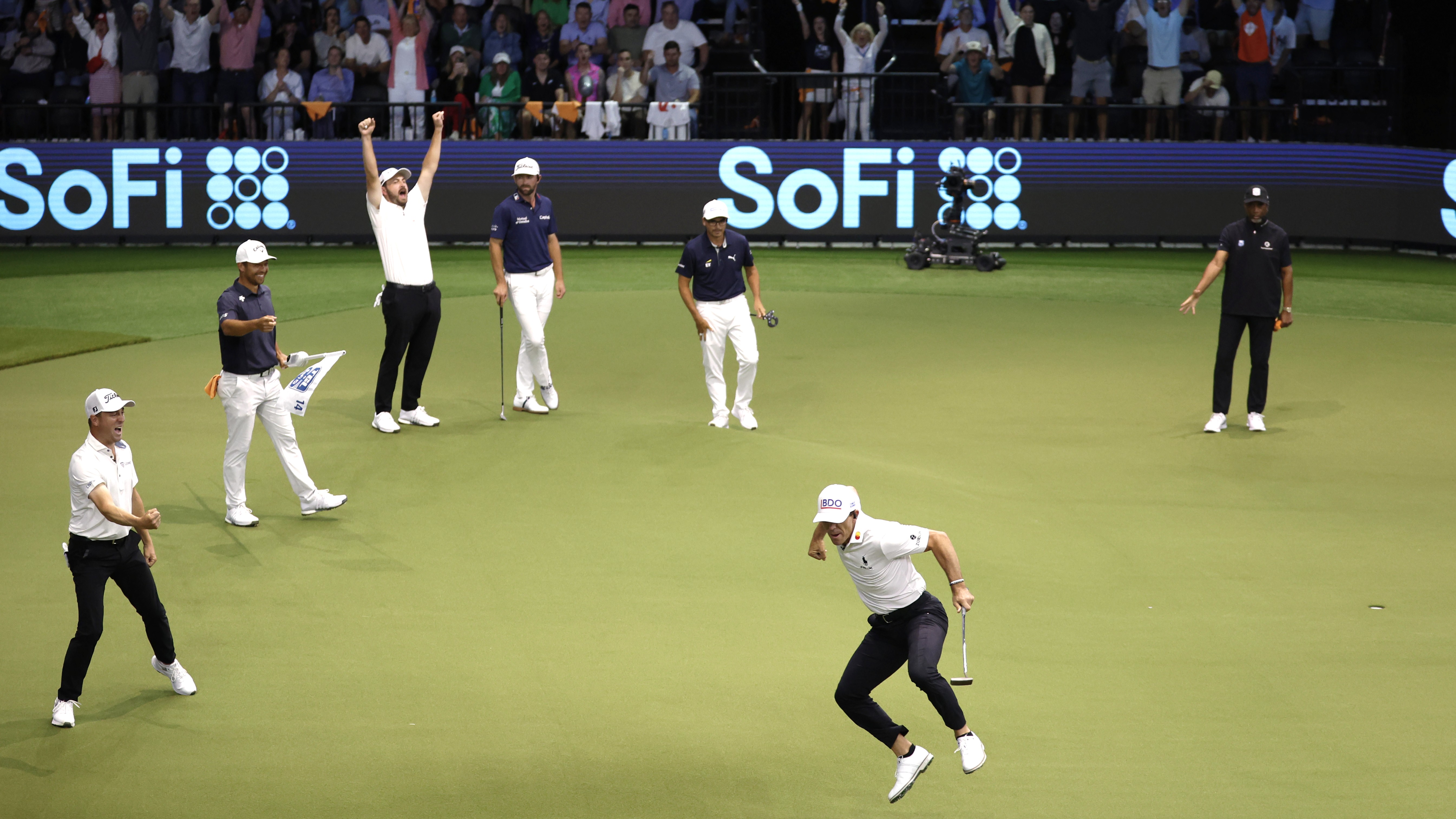 Billy Horschel of Atlanta Drive GC leaps in the air in celebration on the 14th green during the Finals