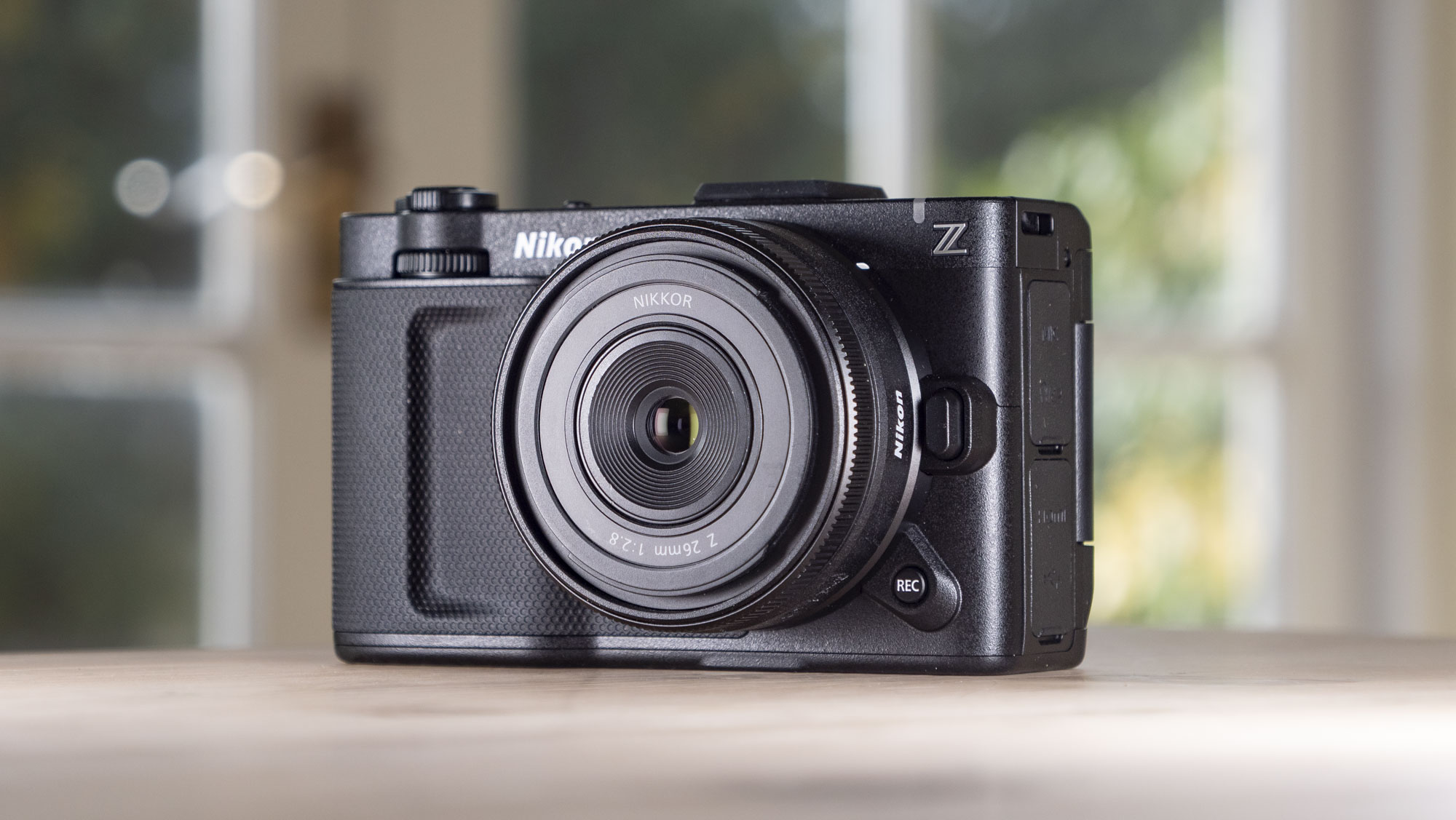 Nikon ZR product photos – camera on a wooden table