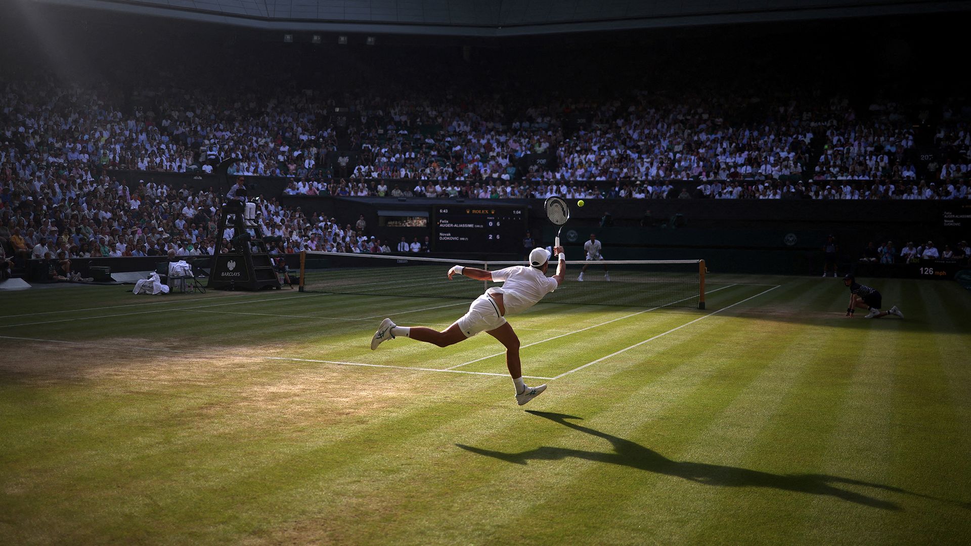 
                                Serbia's Novak Djokovic in action during his quarter final match against Canada's Felix Auger-Aliassime at the Wimbledon Championships in London, United Kingdom
                            