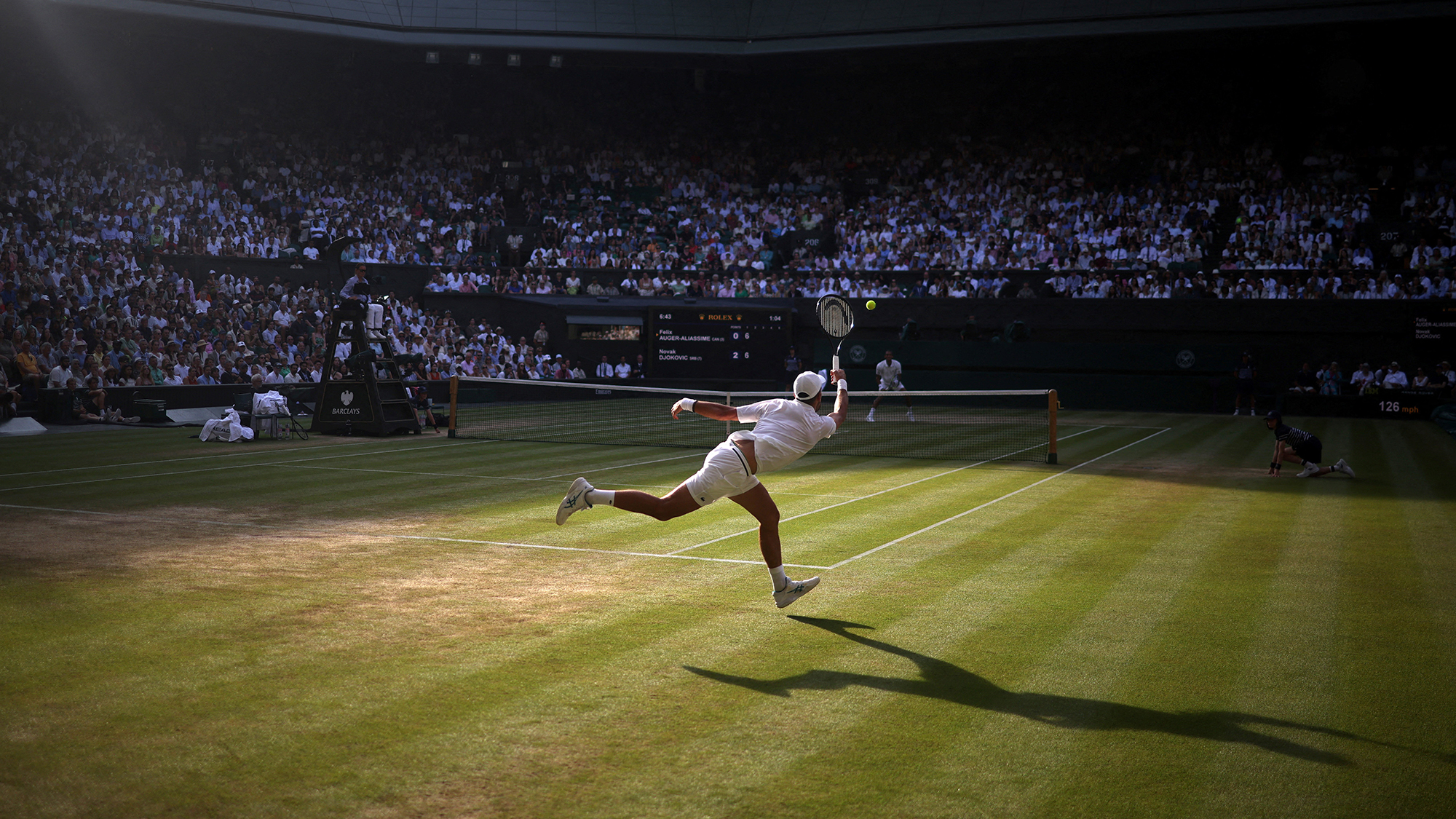 Serbia's Novak Djokovic in action during his quarter final match against Canada's Felix Auger-Aliassime at the Wimbledon Championships in London, United Kingdom