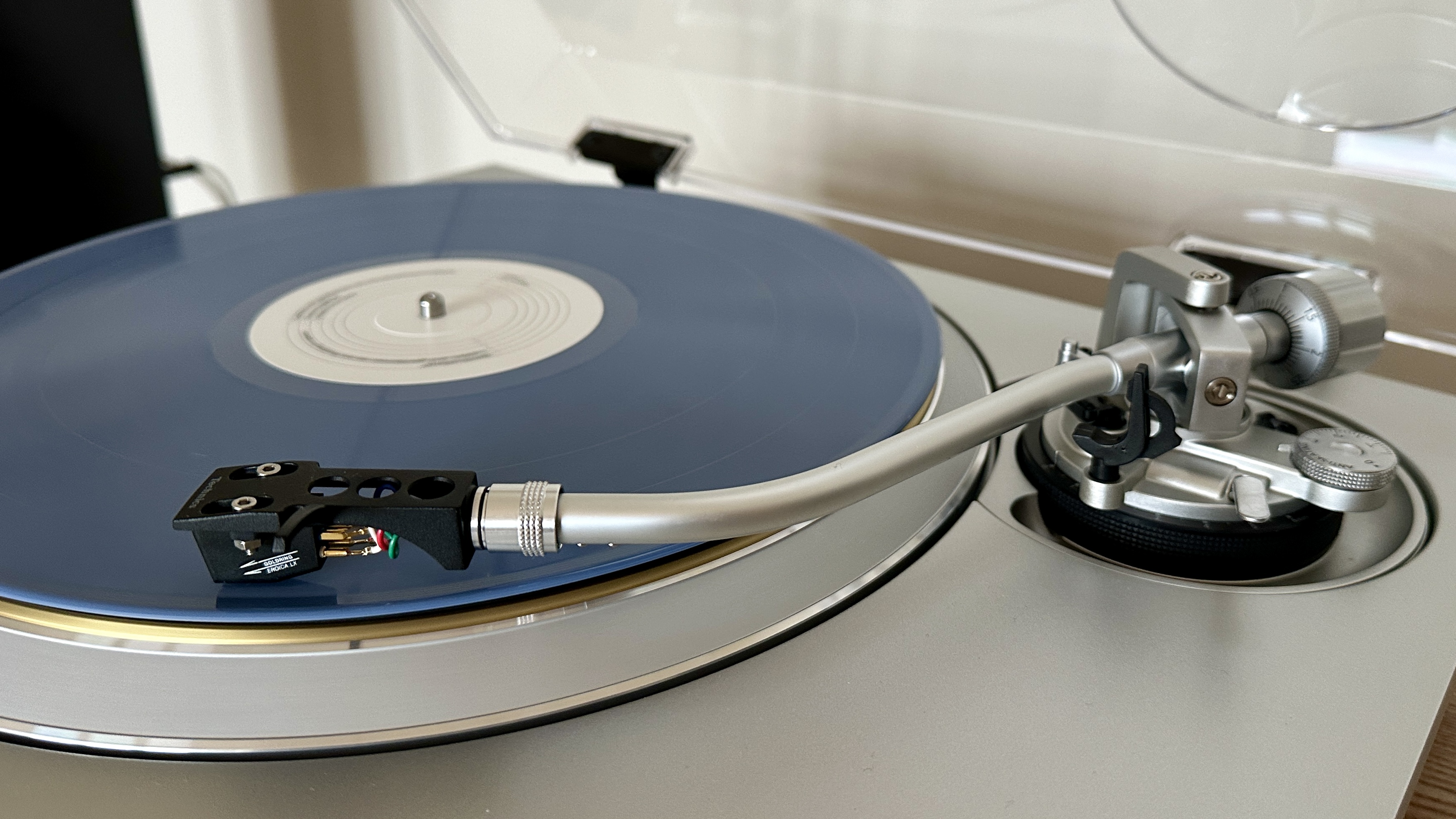 Tonearm and platter of the Technics SL-1300G turntable.