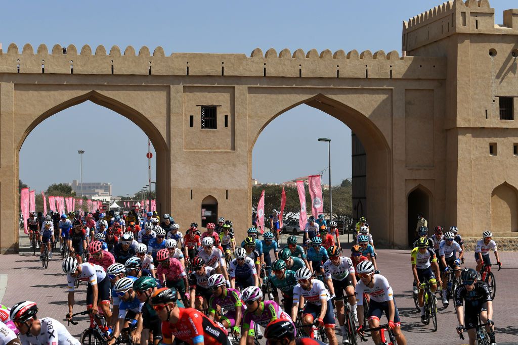 The peloton rolls out from the start