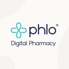 A woman holding a Phlo Clinic box. 