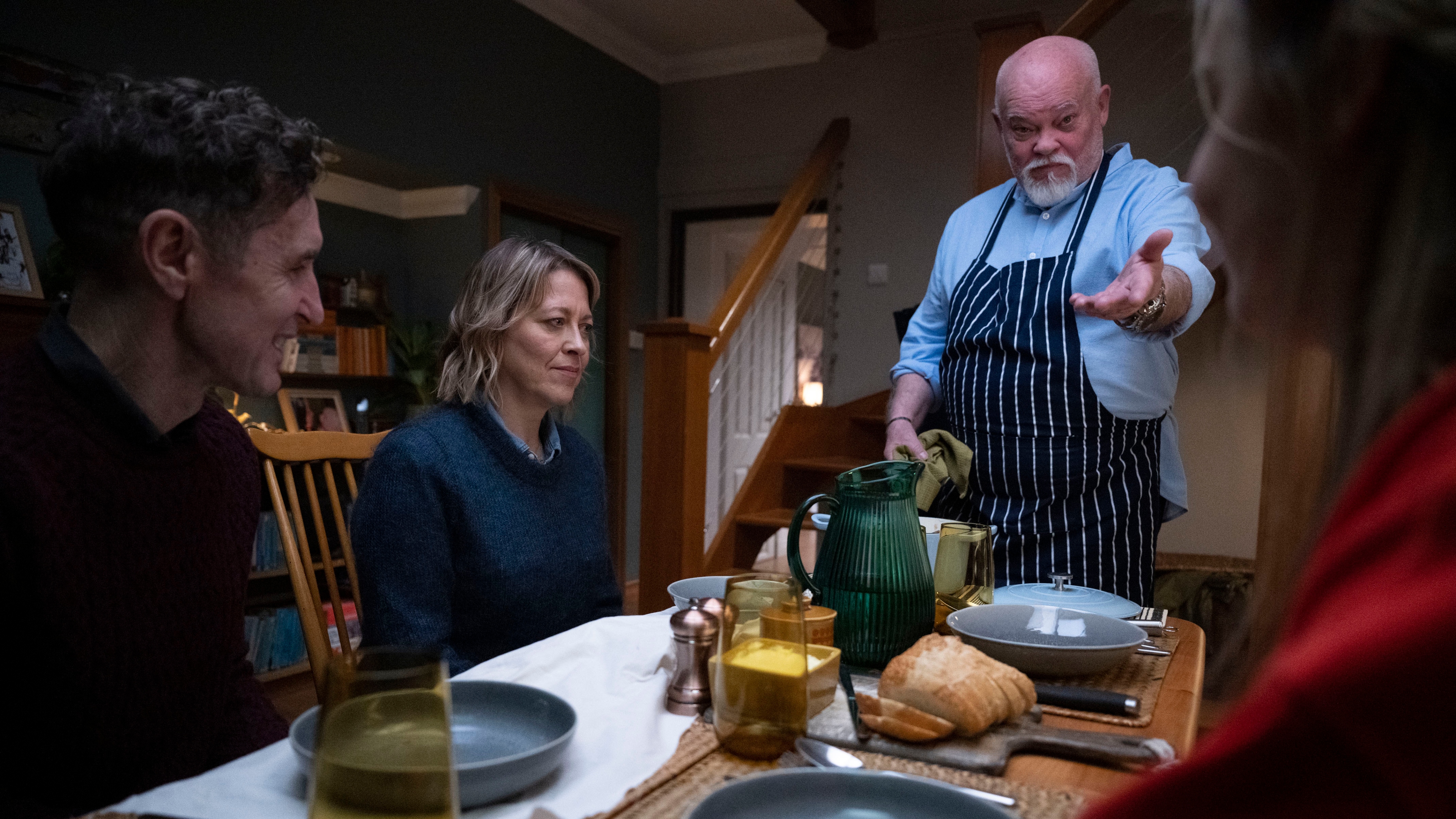 Jake Strathearn (PAUL McGANN), DI Annika Strandhed (NICOLA WALKER), Magnus Strandhed (SVEN HENRIKSEN), Morgan Strandhed (SILVIE FURNEAUX) all sitting at a dining table with empty plates on it
