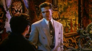 Brad Pitt reprimands Gabriel Byrne in an animated world in Cool World.