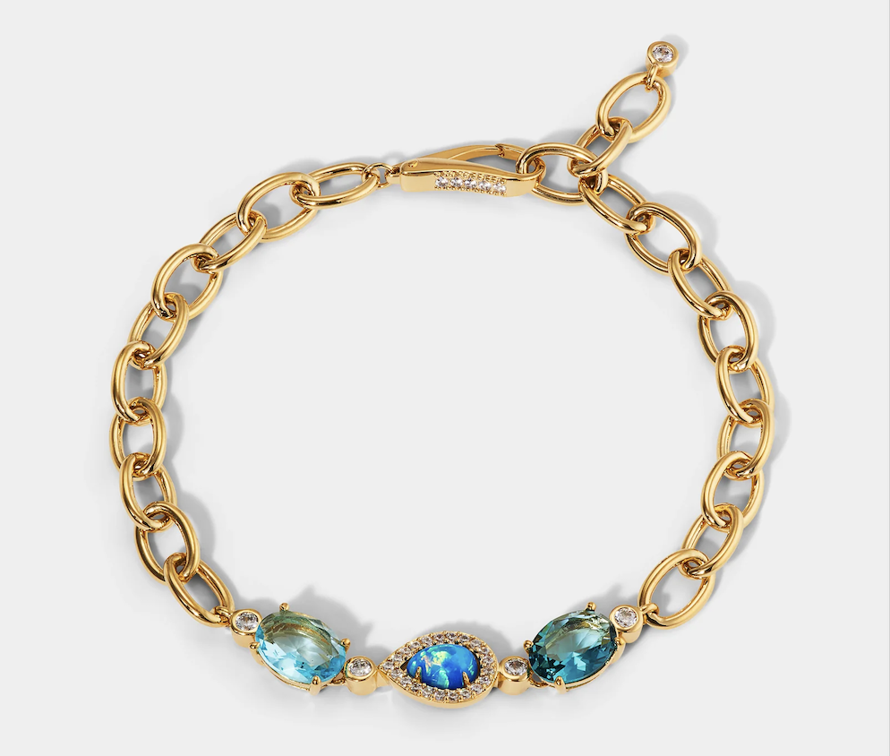 A Nadri bracelet with three blue and opal stones