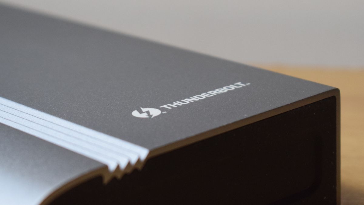 Close-up photo of the Plugable Thunderbolt 4 &amp; USB4 Quad Display Docking Station (TBT4-UDZ) showing the grille design and Thunderbolt branding.