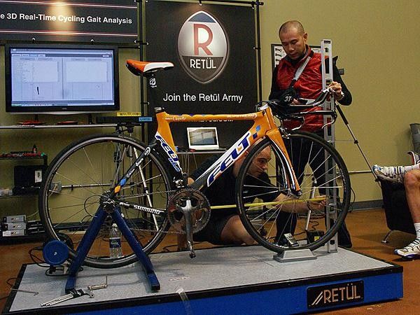 Garmin-Chipotle team physiologist Allen Lim and physical therapist - and bicycle coach - Curtis Cramblett take some measurements the old-fashioned way.