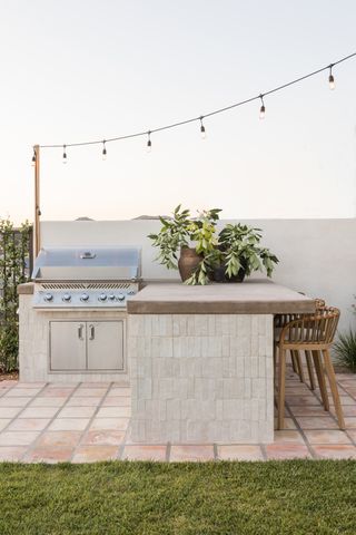 An outdoor kitchen island made in tile