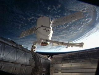 SpaceX Dragon cargo capsule is detached from its berth at the International Space Station on March 26, 2013.