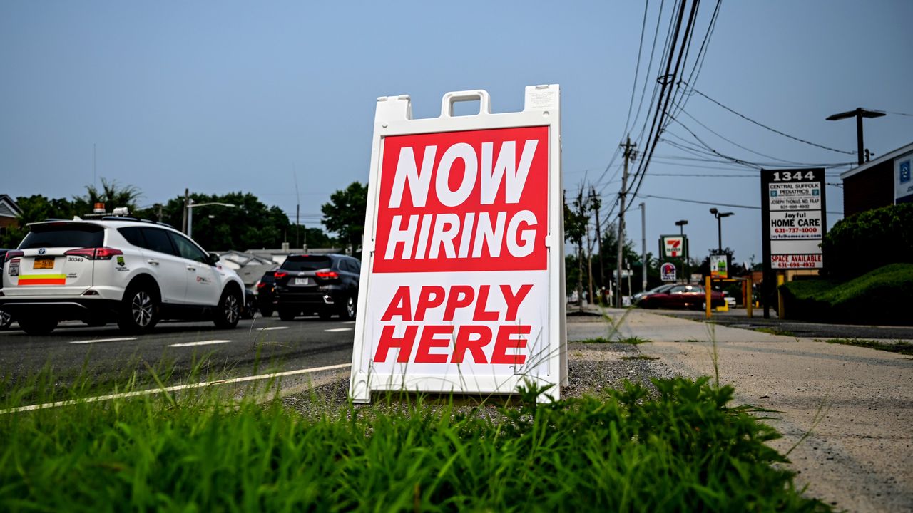 A hiring sign.