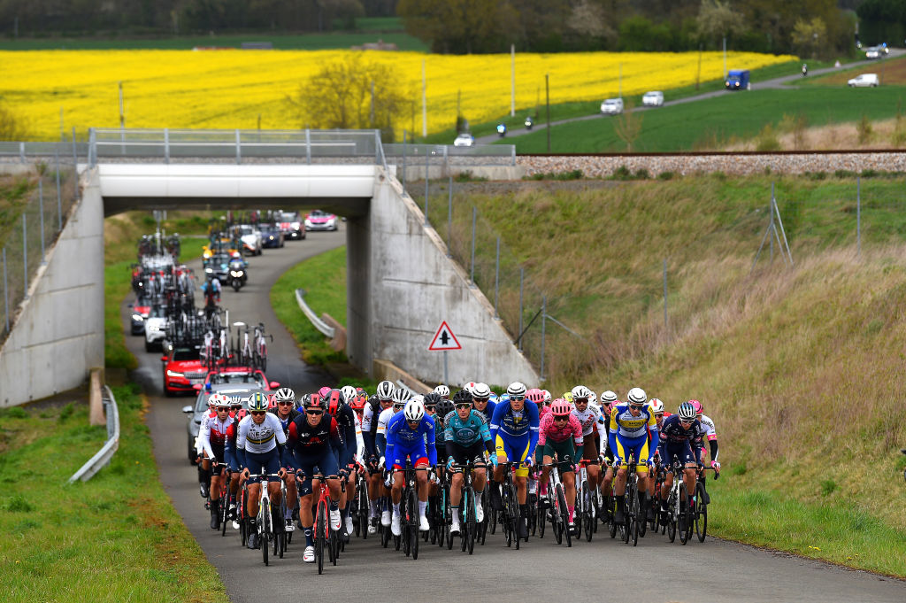 SABLESURSARTHE FRANCE APRIL 07 LR Luke Plapp of Australia and Team INEOS Grenadiers Blue Best Young Rider Jersey Yves Lampaert of Belgium and Team QuickStep Alpha Vinyl Cameron Wurf of Australia and Team INEOS Grenadiers Thibaut Pinot of France and Team Groupama FDJ Gilles De Wilde of Belgium and Team Sport Vlaanderen Baloise Ward Vanhoof of Belgium and Team Sport Vlaanderen Baloise Marijn Van Den Berg of Netherlands and Team EF Education Easypos Antoine Raugel of France and AG2R Citren Team Floris De Tier of Belgium and Team AlpecinFenix and the peloton competes during the 68th Circuit Cycliste Sarthe Pays de la Loire 2022 Stage 3 a 1765km stage from Sabl sur Sarthe to Sabl sur Sarthe CircuitSarthe on April 07 2022 in SablesurSarthe France Photo by Dario BelingheriGetty Images