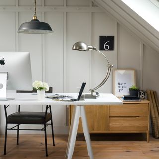 Grey home office with computer on desk