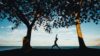 woman doing yoga at Wailea Beach Resort, Maui, Hawaii