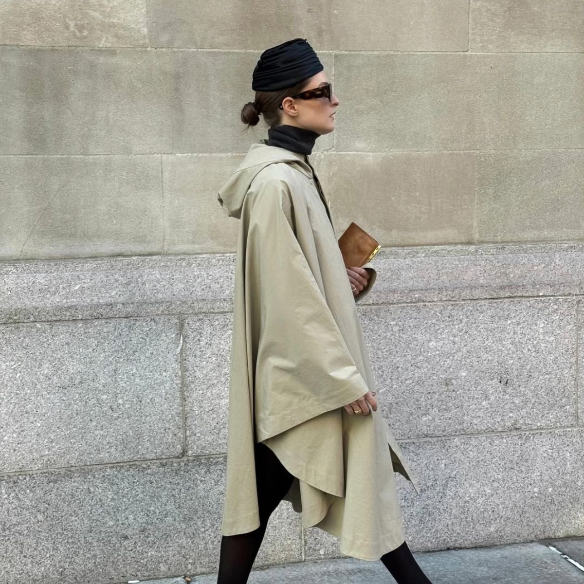 Christie Tyler in black tights and leopard print heels. 