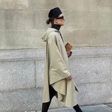 Christie Tyler in black tights and leopard print heels. 