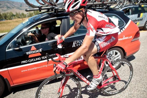 Chase Pinkham (Bissell) makes it back up to his team car after a hard crash.