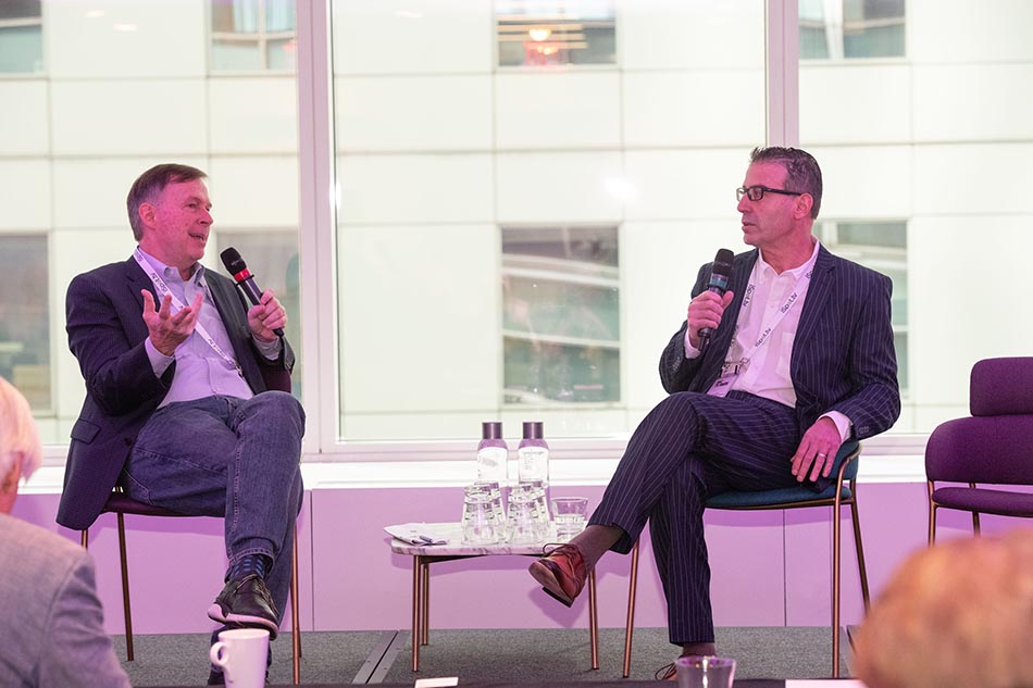 Moderator Tim Hanlon (l.) interviews Dave Apostolico, SVP platform strategy, development & distribution at Qurate Retail Group Networks.