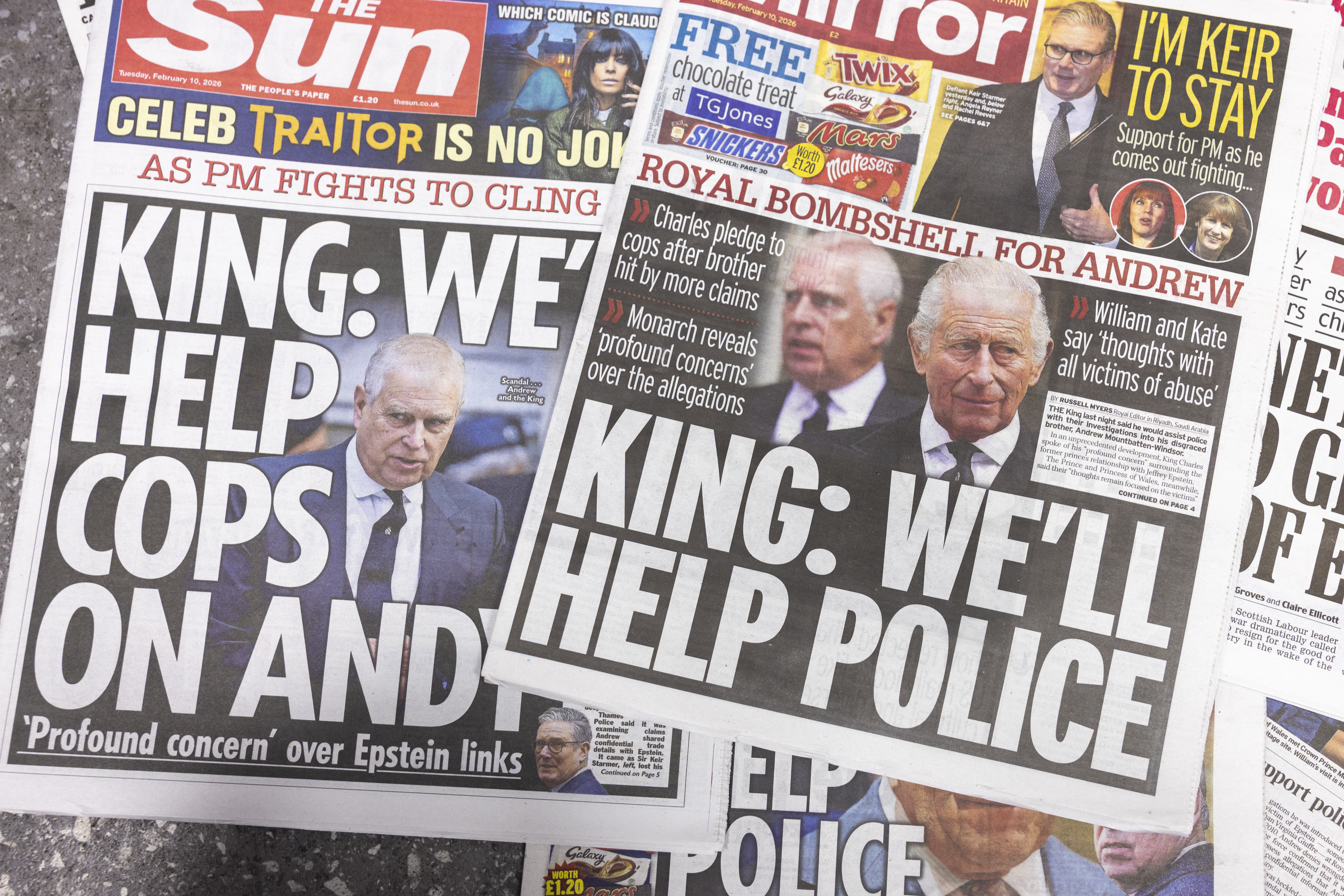 Newspaper swith King Charles and Andrew Mountbatten-Windsor's photo that say King: We'll Help Police