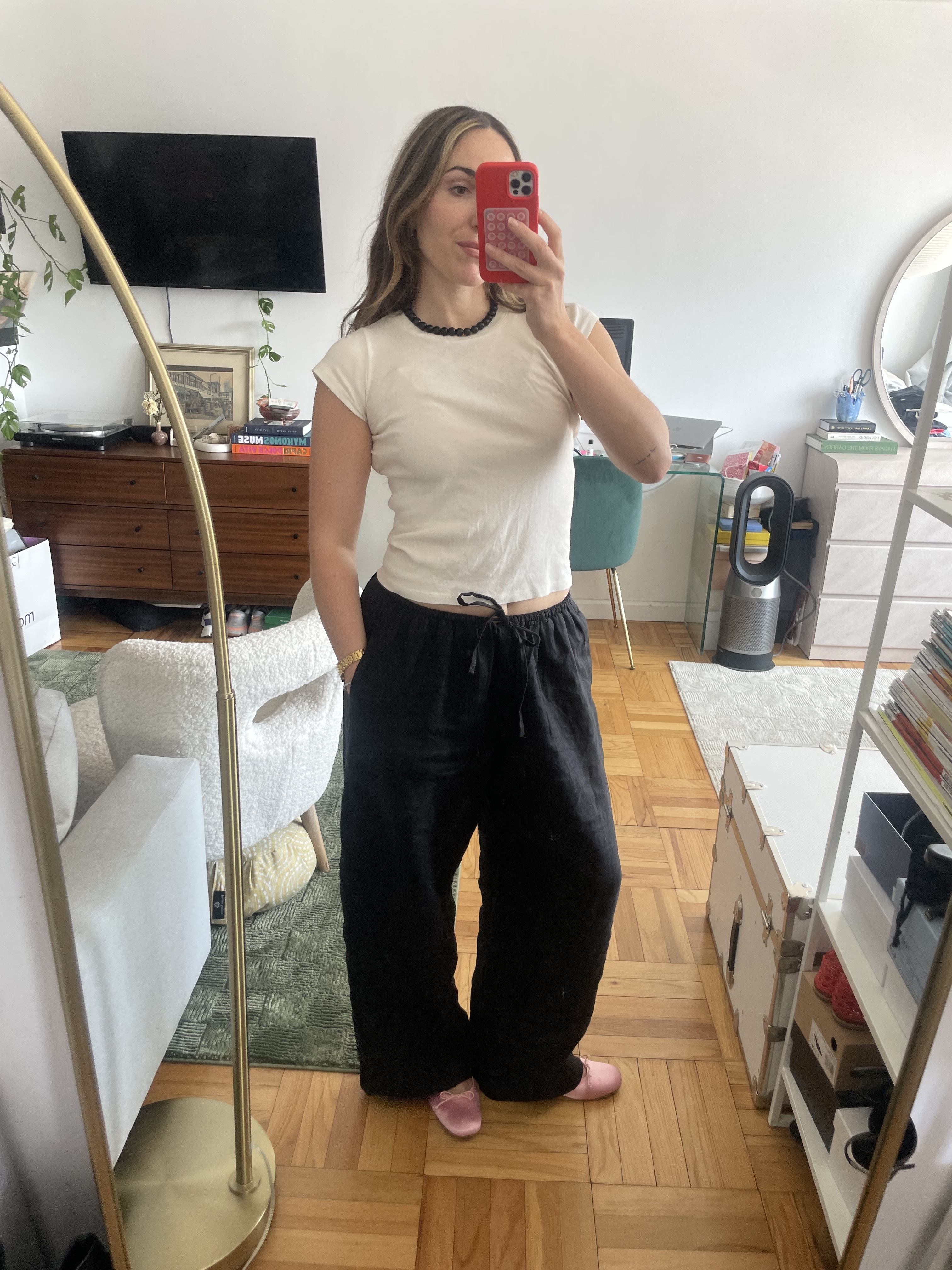Anna LaPlaca wearing the best affordable alternatives to The Row Gala Pants