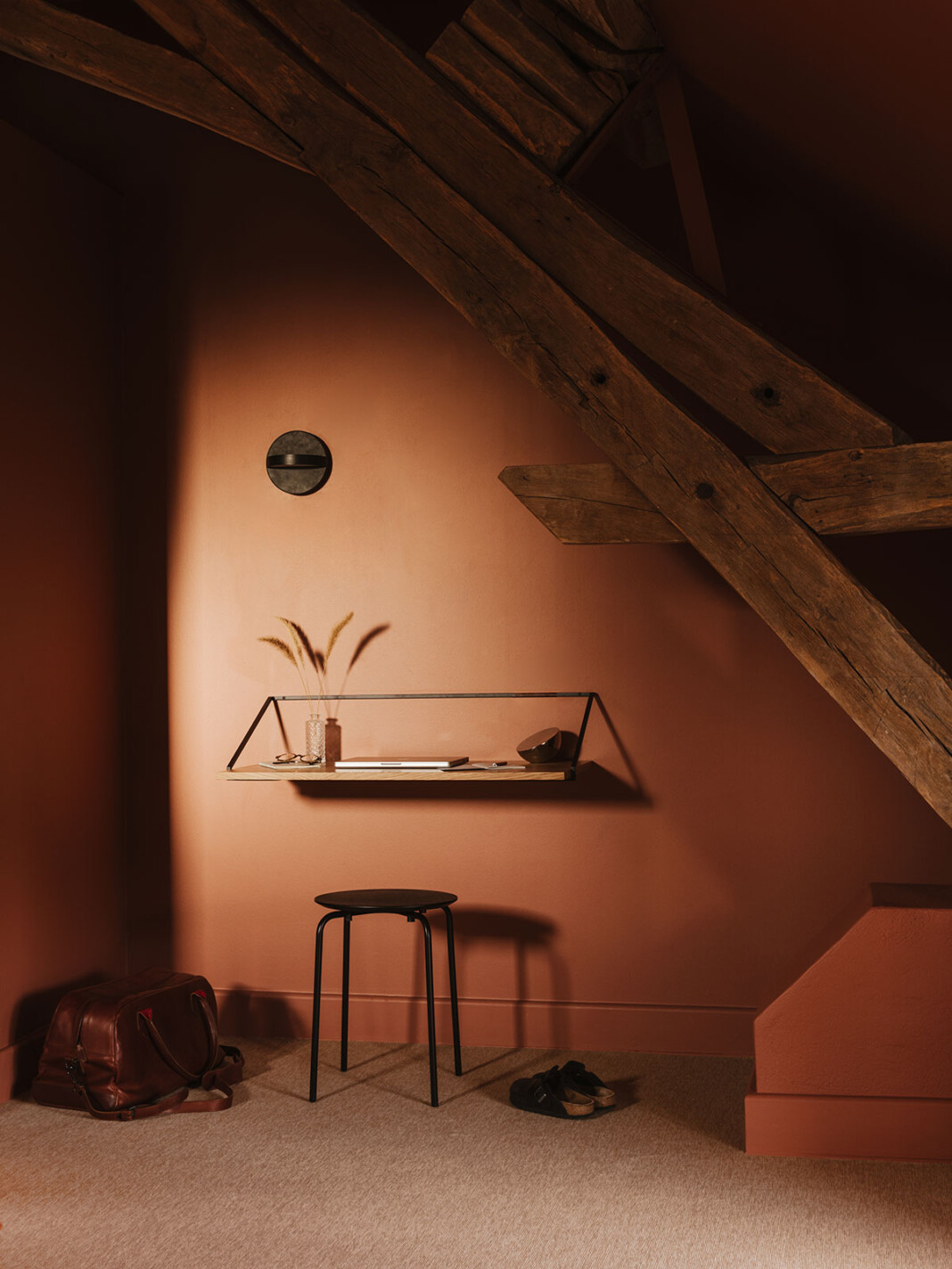 A whimsically decorated guesthouse pairs imaginative, color-blocky interiors with soft lines and palettes with a leafy, nature-immersed exterior.