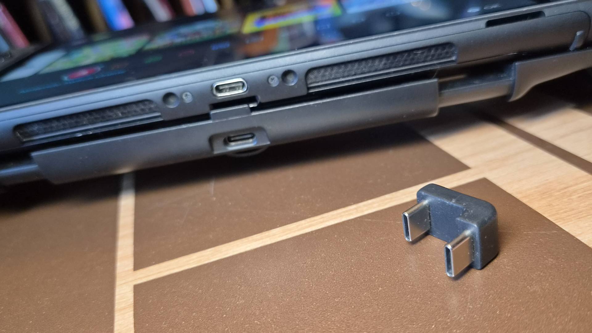 Photo of the CRKD Nitro Deck 2 sitting on a Star Wars-themed wooden table.