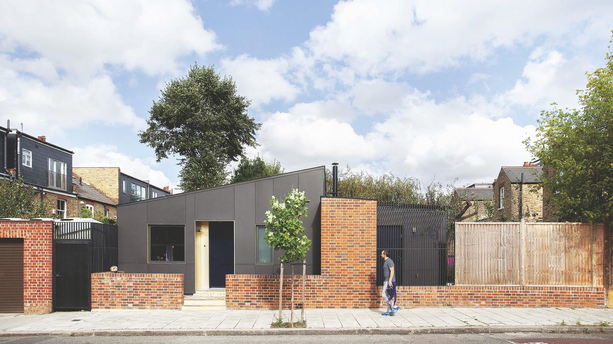 black cladding on small self build with pitched roof